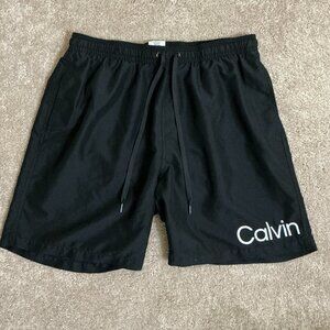 Calvin Klein Men's Logo 7" Volley Swim Trunks